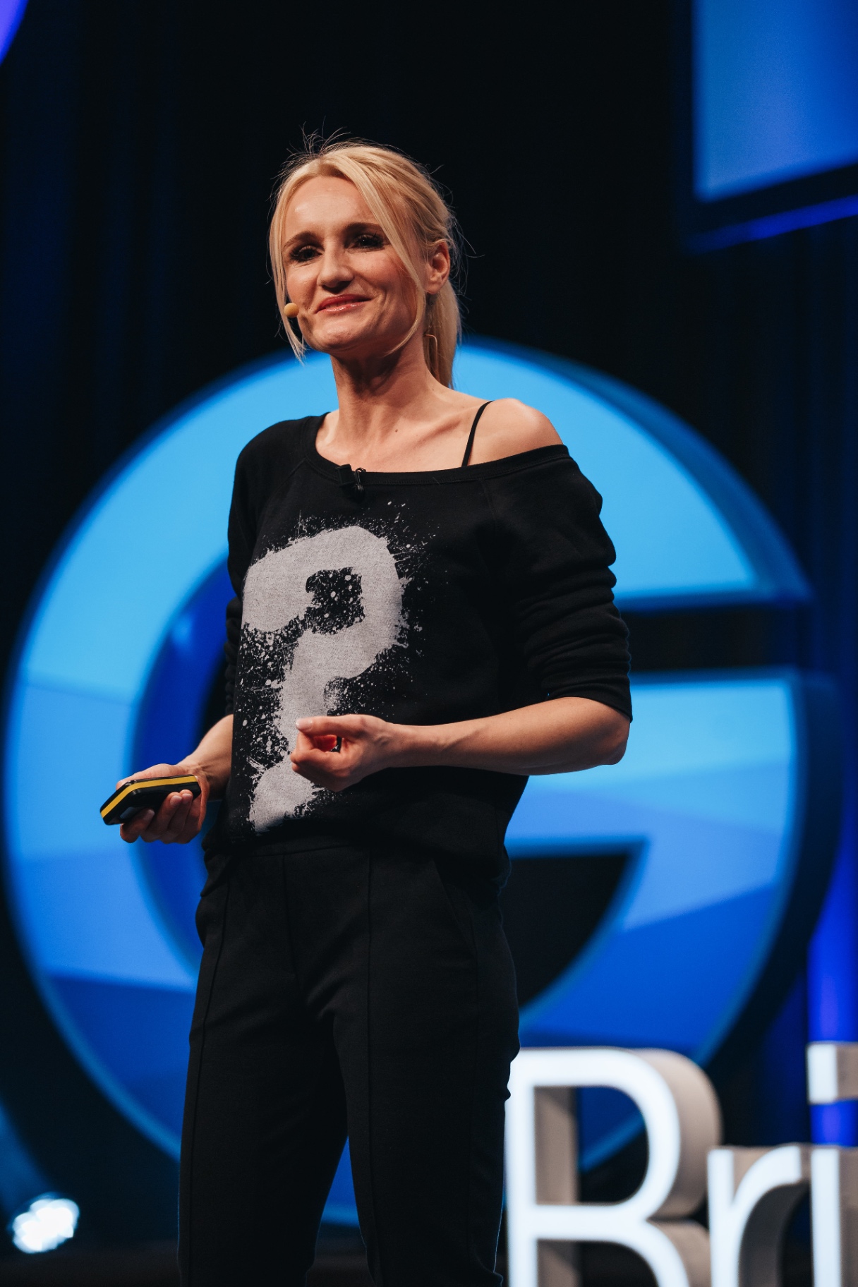 Henriette Hochstein-Frädrich portrait wearing a black sweater with a question-mark print — author of Quit the Feed!